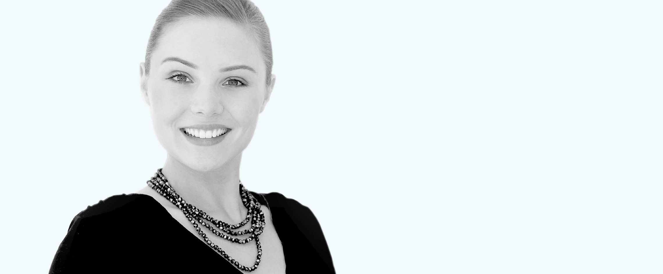 A young woman smiles